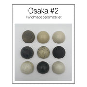 Osaka set van 9 keramische wandkoepels in zwart en gebroken wit, diameter per koepel ca. 9.5 cm